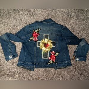 Embellished Denim Jacket features Rhinestone Cross and Embroidery Floral Design